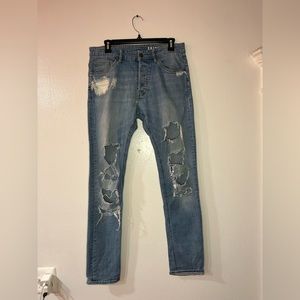 Skinny ripped blue jeans